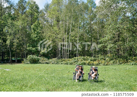 Woman enjoying sauna in the great outdoors 118575509