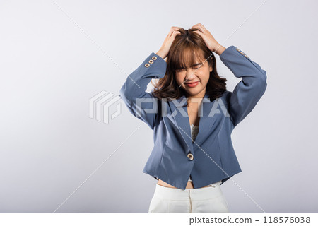 Asian happy portrait beautiful business young woman wearing a suit angry and mad raising fist frustrated and furious while shouting with anger isolated, studio shot on white background and copy space Asian happy portrait beautiful business young woman wearing a suit angry and mad raising fist frustrated and furious while shouting with anger isolated, studio shot on white background and copy space 118576038