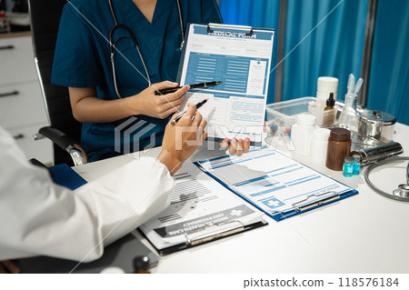 Medical team working on digital tablet healthcare doctor technology tablet using computer analyzed the results of medical reports at the hospital. 118576184