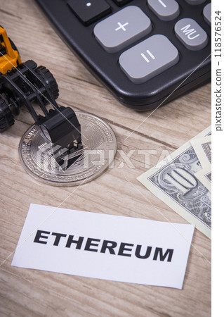 Ethereum coin, dollars, miniature excavator and calculator Ethereum coin, dollars, miniature excavator and calculator 118576524