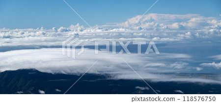 View of rising clouds from the top of a mountain View of rising clouds from the top of a mountain 118576750