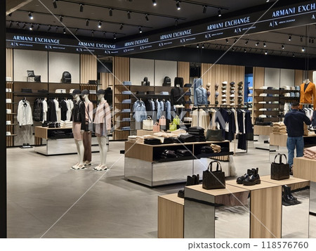 KUALA LUMPUR, MALAYSIA - AUGUST 28, 2024: Armani brand retail shop in the large shopping mall KUALA LUMPUR, MALAYSIA - AUGUST 28, 2024: Armani brand retail shop in the large shopping mall 118576760