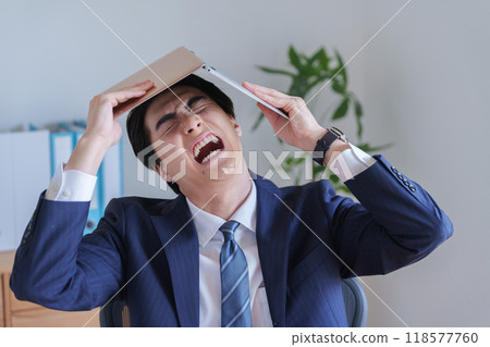 depressed businessman depressed businessman 118577760