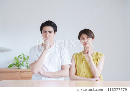 Thinking couple Thinking couple 118577779