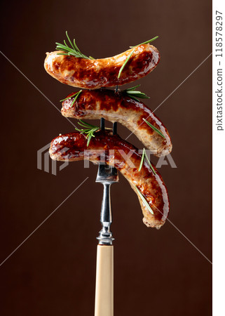Grilled Bavarian sausages with rosemary. Grilled Bavarian sausages with rosemary. 118578297