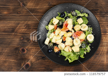 Fresh fruit salad with oranges. 118579757