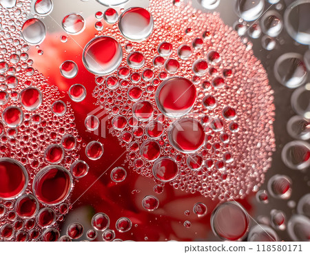 pattern of drops on a glass with reddish transparencies 118580171