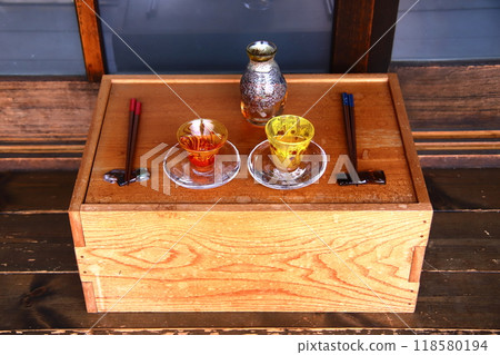 Chopsticks, sake cup and sake bottle 118580194