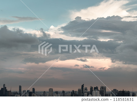 Aerial view of skyscrapers and dramatic sky before sunset. 118581631