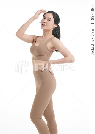 Beautiful young asian sport woman with sportswear ready for exercise on white background, Advertising sportswear and yoga wear, Healthy lifestyle, sport. 118583065