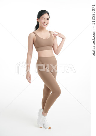 Beautiful young asian sport woman with sportswear ready for exercise on white background, Advertising sportswear and yoga wear, Healthy lifestyle, sport. 118583071