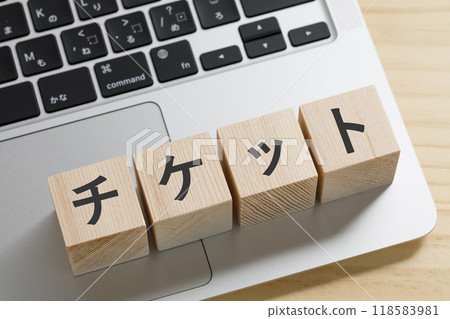 A building block with the word ticket written on it 118583981