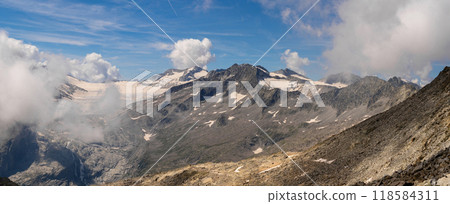 Majestic Mountain Range with Glaciers and Clouds Majestic Mountain Range with Glaciers and Clouds 118584311