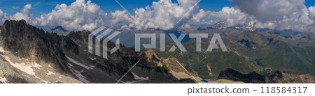 Expansive Panoramic View of Mountain Range Under Cloudy Sky.. 118584317