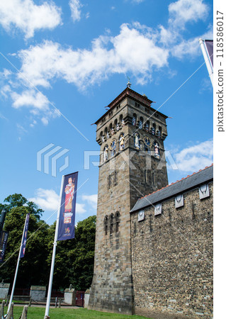 Historic brick walls and ornate watchtowers of Cardiff Castle in Cardiff, the capital of Wales Historic brick walls and ornate watchtowers of Cardiff Castle in Cardiff, the capital of Wales 118586017