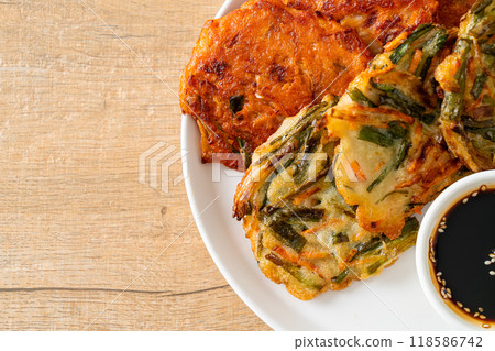 Pajeon or Korean pancake and Korean Kimchi pancake or Kimchijeon on white background 118586742