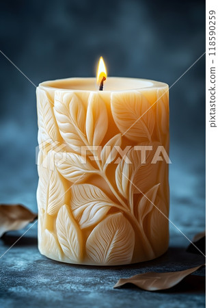 Photo of a beautiful carved candle with floral patterns Photo of a beautiful carved candle with floral patterns 118590259
