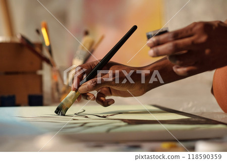 Painter Creating Artwork With Brushes Holding Paint 118590359