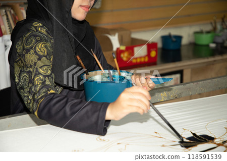 Batik design motif and pattern. traditional Malaysian fabric Batik design motif and pattern. traditional Malaysian fabric 118591539