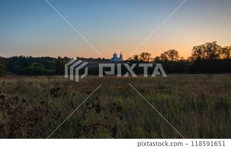 Rural landscape with a church on the background of sunset 118591651