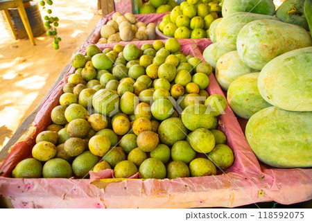 Road side fruit stall selling banana and other fruits Road side fruit stall selling banana and other fruits 118592075
