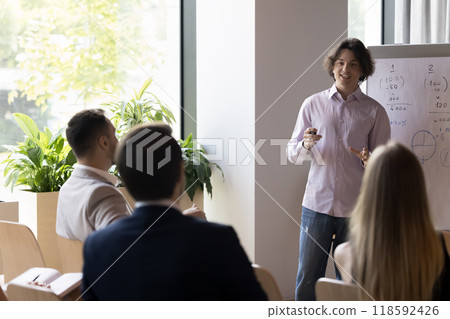 Happy positive young startup leader man meeting with investors Happy positive young startup leader man meeting with investors 118592426