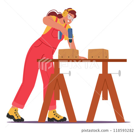 Female Carpenter Using A Drill To Work On Wooden Blocks While Wearing Protective Gear In A Workshop Setting 118593282