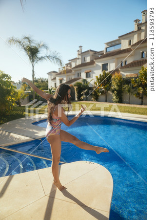 Experience the Joyful Summer Vibes while lounging by the Poolside enjoying every moment Experience the Joyful Summer Vibes while lounging by the Poolside enjoying every moment 118593793