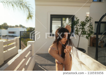 Serene Morning Vibes A Peaceful Moment of Deep Reflection by the Calm Poolside Area 118593856