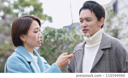 A quarrelling couple (winter clothes, coat, jacket) A quarrelling couple (winter clothes, coat, jacket) 118594980