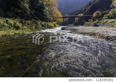 A bridge over Mitake Valley in autumn 118595091