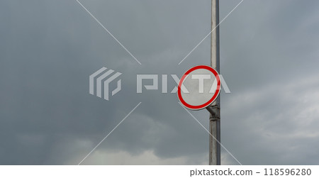 Blank Round Traffic Sign on Pillar with Cloudy Sky Background. Blank Round Traffic Sign on Pillar with Cloudy Sky Background. 118596280