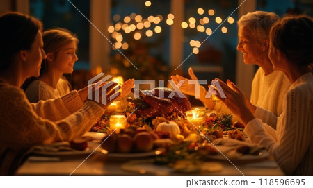 Family Giving Thanks at a Festive Dinner Table 118596695