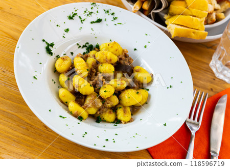 Gnocchi with aubergine and minced meat 118596719