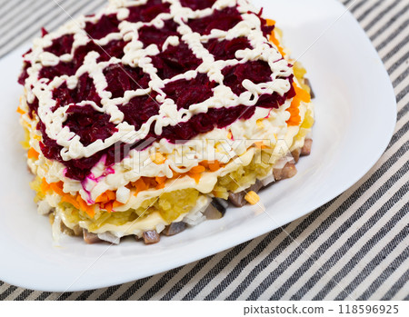 Russian dressed herring salad 118596925