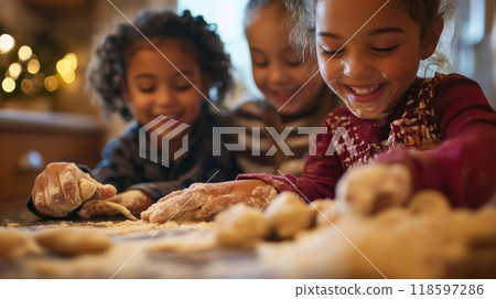 Three Young Girls Laughing While Making Dough Together 118597286