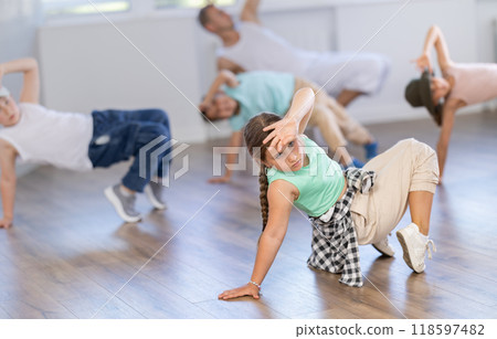 Group of children dancers having break dance training at dance studio Group of children dancers having break dance training at dance studio 118597482