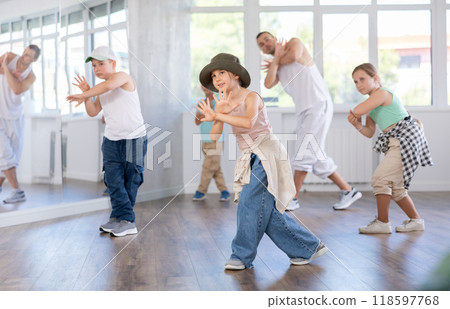Tween girl mastering krump dance in children dance studio 118597768