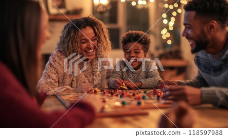 Family playing board game together at home, laughing 118597988