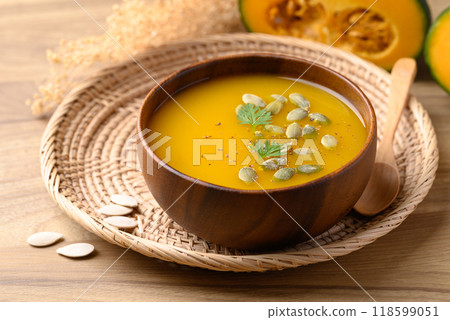 Pumpkin soup in wooden bowl, Homemade food in autumn season 118599051