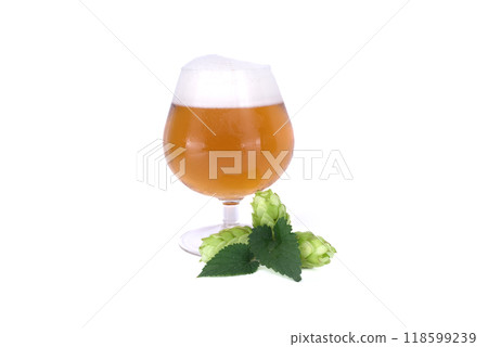 Glass of craft beer paired with fresh hops isolated on white background Glass of craft beer paired with fresh hops isolated on white background 118599239