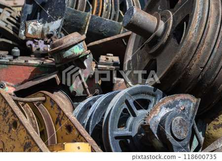 Old tractor parts, Rusty ndustrial machinery and other used at second hand parts car shop. 118600735