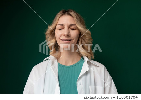 Woman Wearing White Lab Coat and Green Shirt Woman Wearing White Lab Coat and Green Shirt 118601704