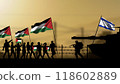 Silhouette of Palestinian protesters against armed Israeli soldiers, with barbed wire in the background 118602889
