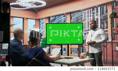 Mature couple attend a consultation with a financial broker about retirement plans, isolated mockup screen on laptop. Specialist and clients covering savings growth and financial security. Camera B. 118603571