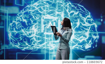 Developer using tablet to implement artificial intelligence parallel processing, breaking up complex computational tasks enabling AI systems to process more input data faster, camera B 118603672