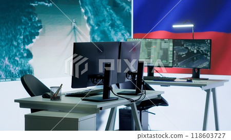 Empty army command post with the russian flag running on big screen, russian federation and government working on propaganda to spread fake news among the population. Camera A. Empty army command post with the russian flag running on big screen, russian federation and government working on propaganda to spread fake news among the population. Camera A. 118603727