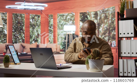 Business analyst presenting the project updates on phone call with investors, ensuring organizational success. Entrepreneur allocating resources according to the market needs. Camera B. 118603769