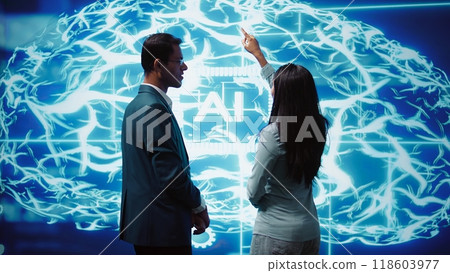 Teamworking colleagues implementing artificial intelligence parallel processing, breaking up complex computational tasks enabling AI systems to process more input data faster, camera B 118603977