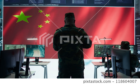 American army working in a command post with green screen, soldiers examining satellite imagery for clues regarding a national safety operation. US military control tower for surveillance. Camera A. American army working in a command post with green screen, soldiers examining satellite imagery for clues regarding a national safety operation. US military control tower for surveillance. Camera A. 118604007